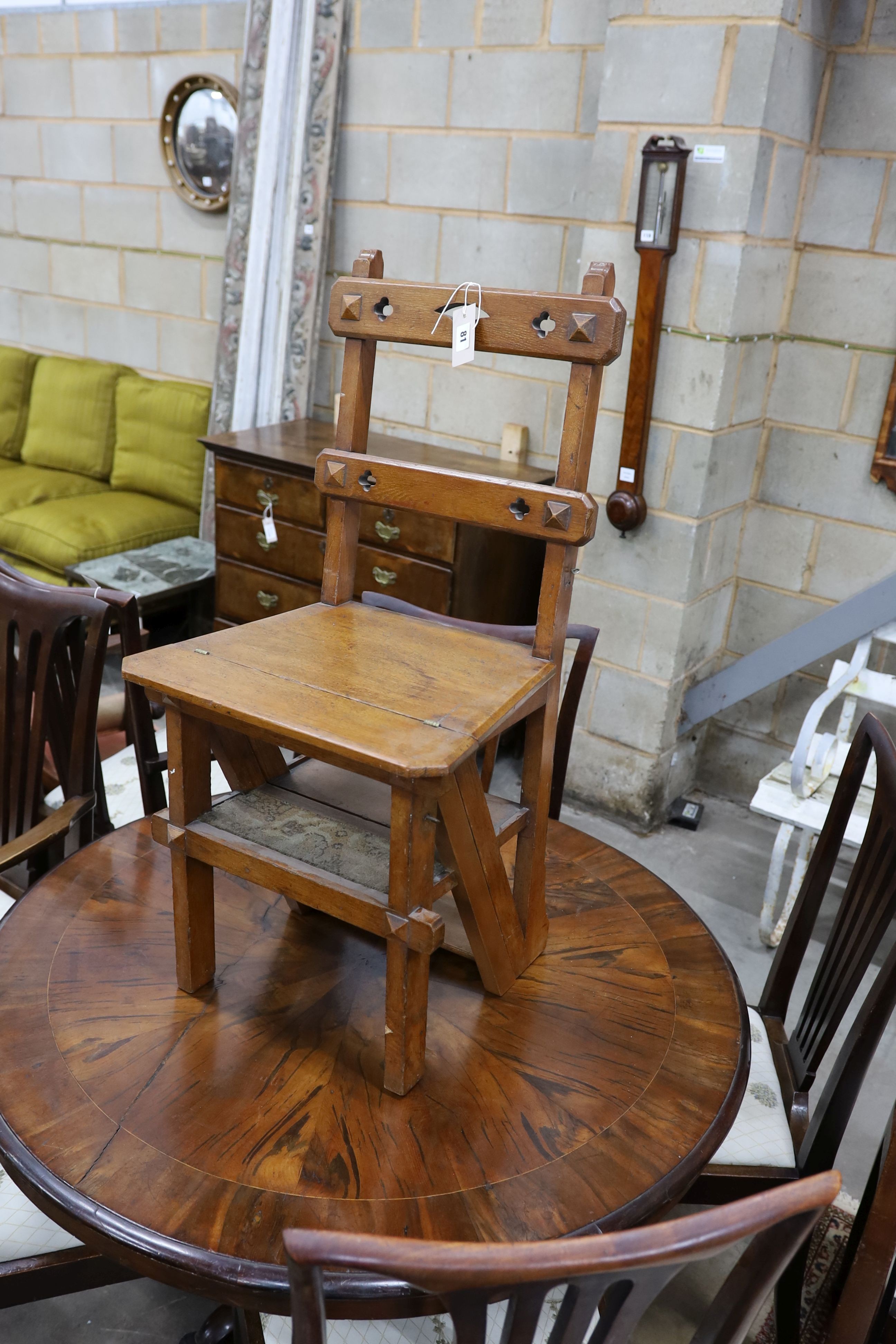 A late Victorian golden oak metamorphic library chair